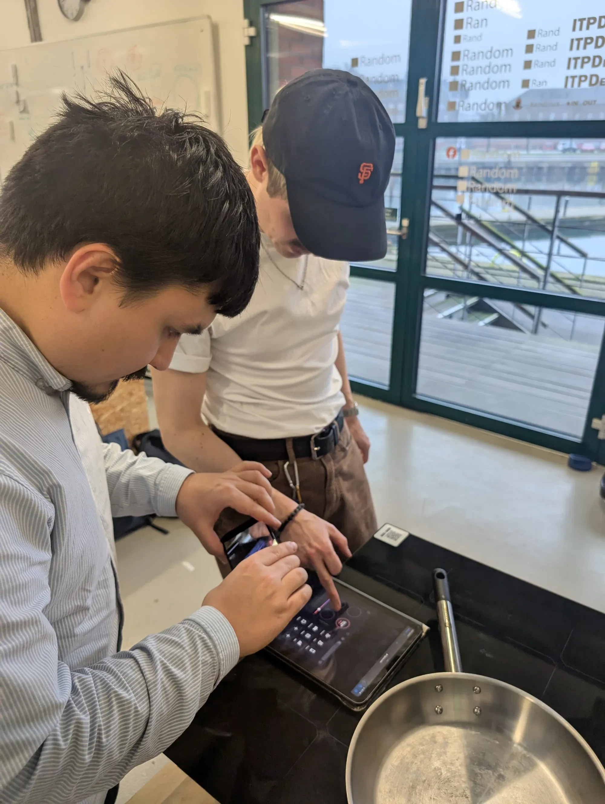 A participant cooking with the prototype during the workshop test